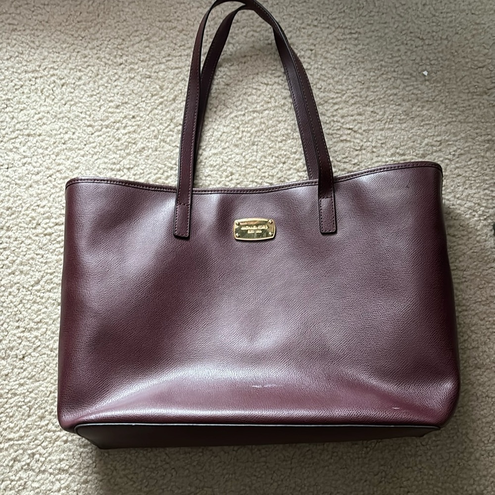 Used Michael Kors laptop bag in Maroon